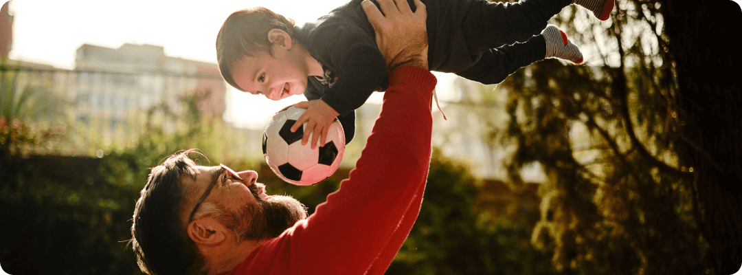 Dad playing with son